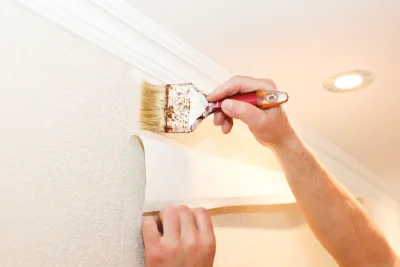 Pose de papier peint à Hermes — revêtements muraux et toiles de verre